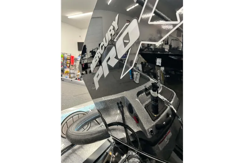 Slide: The Image of Close-up of a Mercury Pro outboard motor on a 2022 Nitro Z21 XL boat. - 8