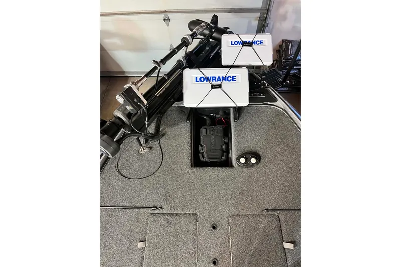 Slide: The Image of 2022 Nitro Z21 XL boat deck with Lowrance electronics and trolling motor. - 9