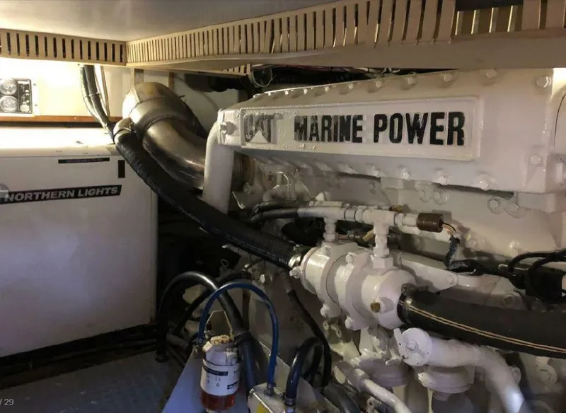 Slide: The Image of Engine room of the 2000 Sabreline 47 with CAT Marine Power engine. - 22