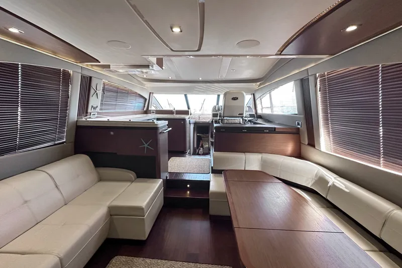 Slide: The Image of Luxurious interior of 2014 Sea Ray 510 Fly yacht with elegant seating and modern design. - 14