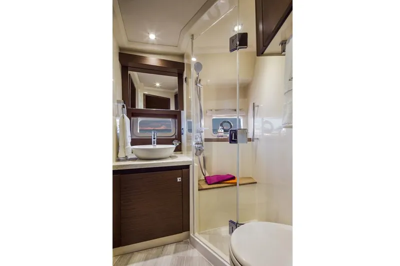 Slide: The Image of Manufacturer Provided Image: 2014 Sea Ray 510 Fly yacht bathroom with modern fixtures and glass shower. - 16