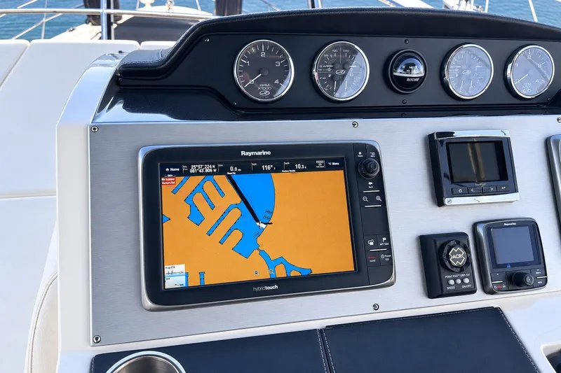 Slide: The Image of Dashboard of 2014 Sea Ray 510 Fly with navigation and control instruments. - 43