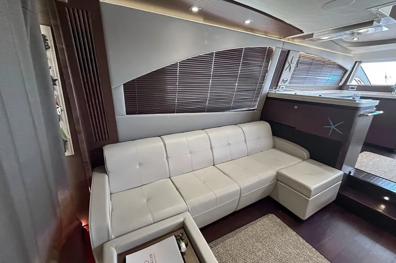 Slide: The Image of Luxurious interior of 2014 Sea Ray 510 Fly yacht with white leather seating. - 15