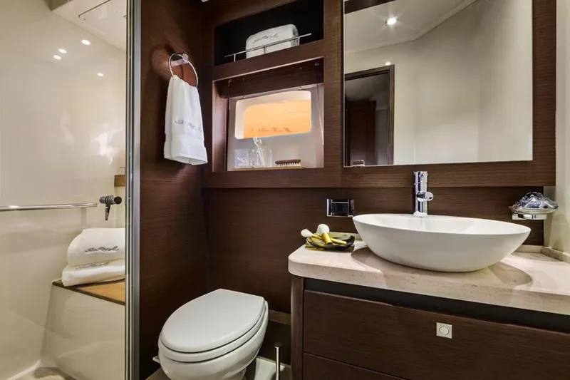 Slide: The Image of Manufacturer Provided Image: Luxurious bathroom in 2014 Sea Ray 510 Fly yacht with modern fixtures and elegant design. - 15