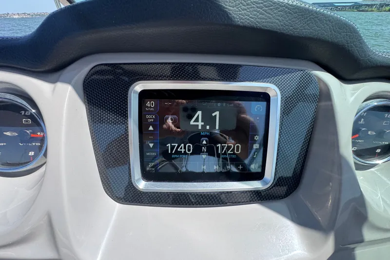 Slide: The Image of Dashboard of 2020 Chaparral Vortex 223 VRX showing speed and RPM gauges. - 15