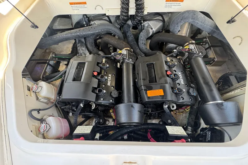 Slide: The Image of Engine compartment of 2020 Chaparral Vortex 223 VRX with dual Rotax engines. - 28