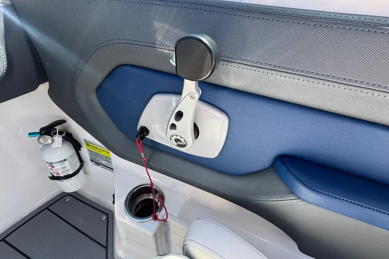 Slide: The Image of Interior of 2020 Chaparral Vortex 223 VRX boat with safety equipment and cup holder. - 16