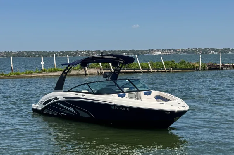 Slide: The Image of 2020 Chaparral Vortex 223 VRX boat on a calm lake with clear skies. - 4