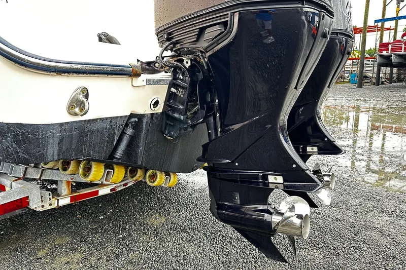 Slide: The Image of 2007 Grady-White Express 305 boat engine and propeller on a trailer. - 22