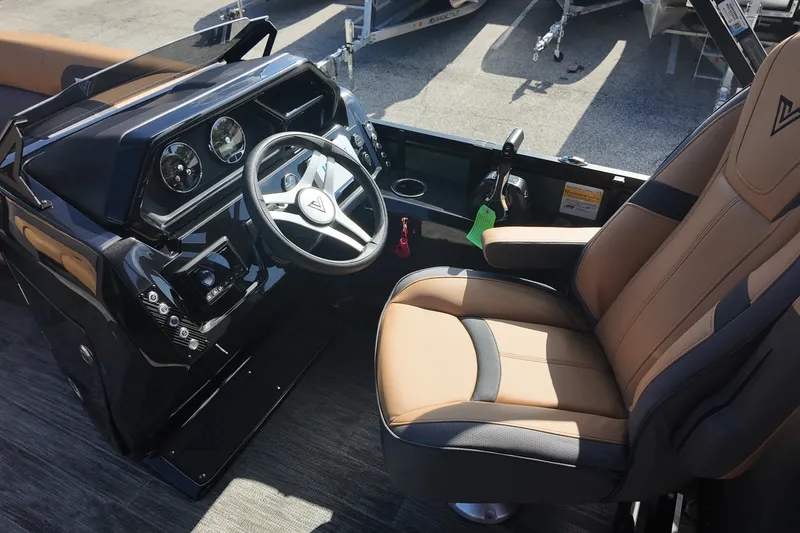 Slide: The Image of Interior of 2027 Viaggio x20u boat, featuring sleek dashboard and comfortable captain's chair. - 15