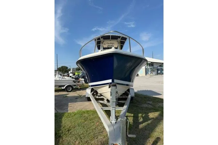 Slide: The Image of 2000 KenCraft Challenger 206 boat on trailer under clear blue sky. - 3