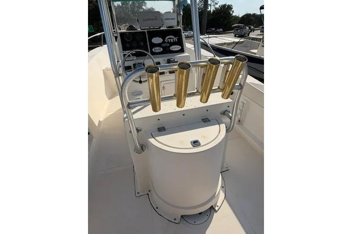 Slide: The Image of KenCraft Challenger 206 boat console with rod holders, steering wheel, and control panel, year 2000 model. - 13