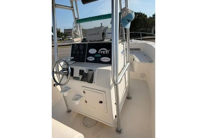 Slide: The Image of 2000 KenCraft Challenger 206 boat console with steering wheel and navigation equipment. - 15