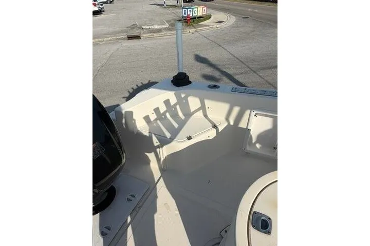 Slide: The Image of 2000 KenCraft Challenger 206 boat interior with rod holders and deck view. - 6