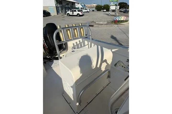 Slide: The Image of KenCraft Challenger 206 boat, 2000 model, featuring a central console and rod holders. - 4