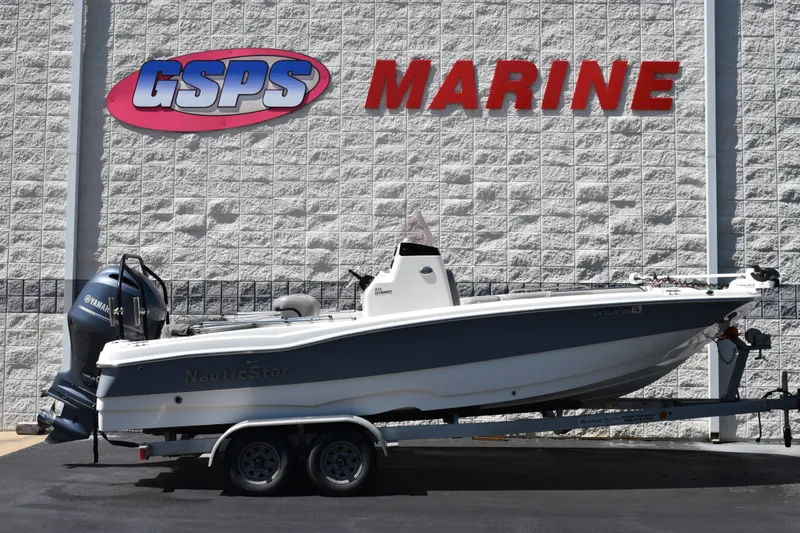The Image of 2021 NauticStar 211 Hybrid boat on trailer at GSPS Marine dealership. - 1