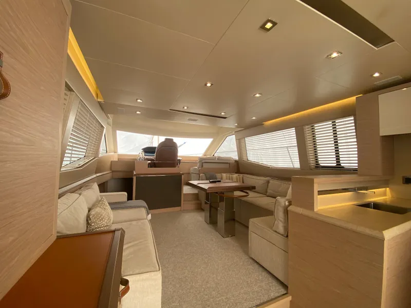 Slide: The Image of Luxurious interior of 2017 Beneteau Monte Carlo MC6 yacht with modern furnishings and ambient lighting. - 21