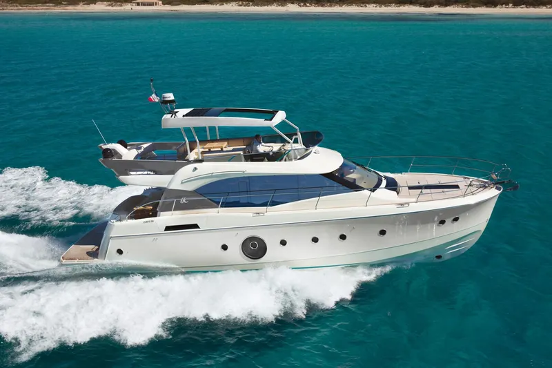 Slide: The Image of 2017 Beneteau Monte Carlo MC6 yacht cruising on turquoise waters. - 3