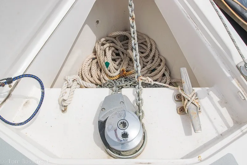 Slide: The Image of Anchor locker of 2007 Hunter 41 Aft Cockpit with rope and chain. - 46
