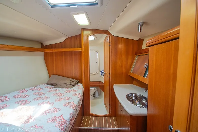 Slide: The Image of Interior of 2007 Hunter 41 Aft Cockpit yacht with cozy cabin and bathroom. - 22