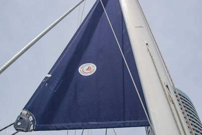 Slide: The Image of Blue sail on a 2007 Hunter 41 Aft Cockpit yacht, featuring Precision Sails logo. - 44