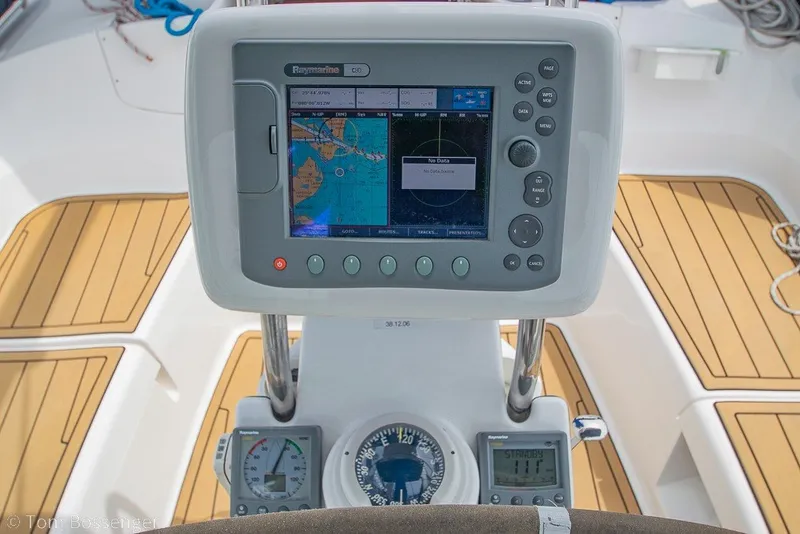 Slide: The Image of Cockpit navigation system on 2007 Hunter 41 Aft Cockpit sailboat, featuring Raymarine display. - 33
