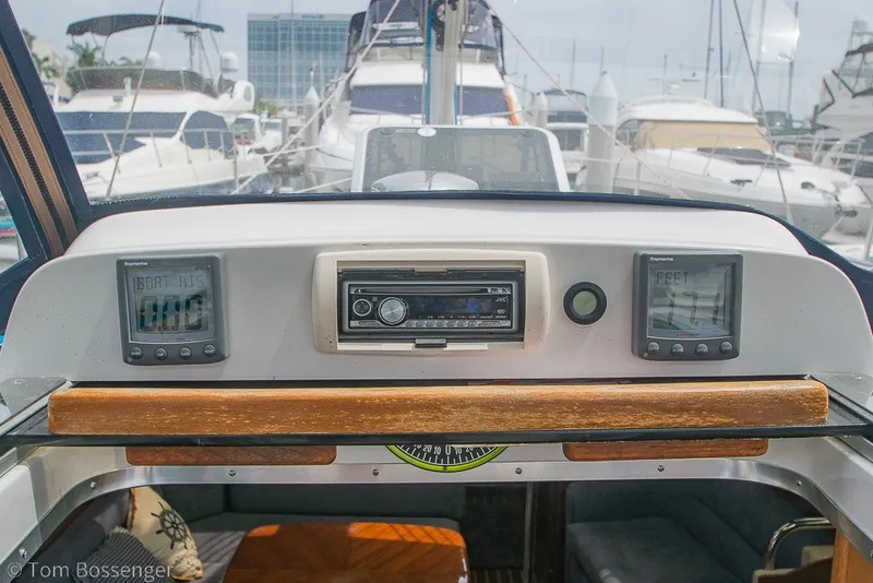 Slide: The Image of Control panel of a 2007 Hunter 41 Aft Cockpit yacht at a marina. - 34
