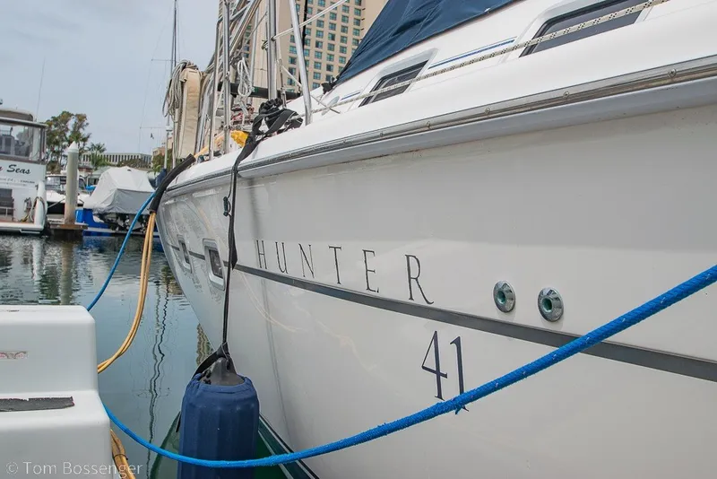 Slide: The Image of 2007 Hunter 41 Aft Cockpit yacht docked in marina, side view. - 5