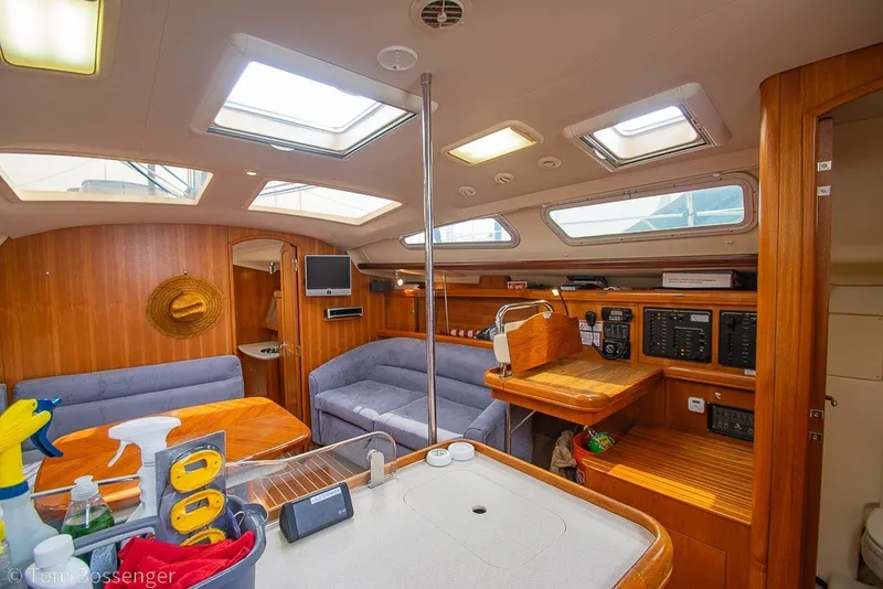 Slide: The Image of Interior of 2007 Hunter 41 Aft Cockpit yacht with wood finish and skylights. - 11
