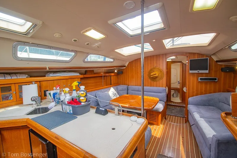 Slide: The Image of Luxurious interior of 2007 Hunter 41 Aft Cockpit yacht with cozy seating and modern amenities. - 10