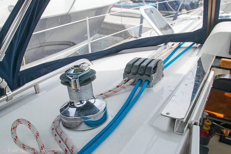 Slide: The Image of 2007 Hunter 41 Aft Cockpit sailboat deck with winch and ropes. - 38