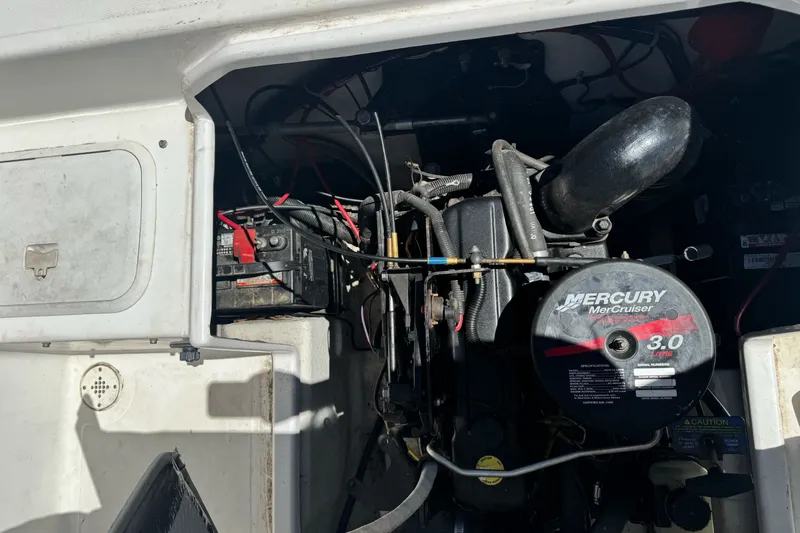Slide: The Image of Engine compartment of a 2003 Seapro 190 WA boat with Mercury MerCruiser 3.0L engine. - 17