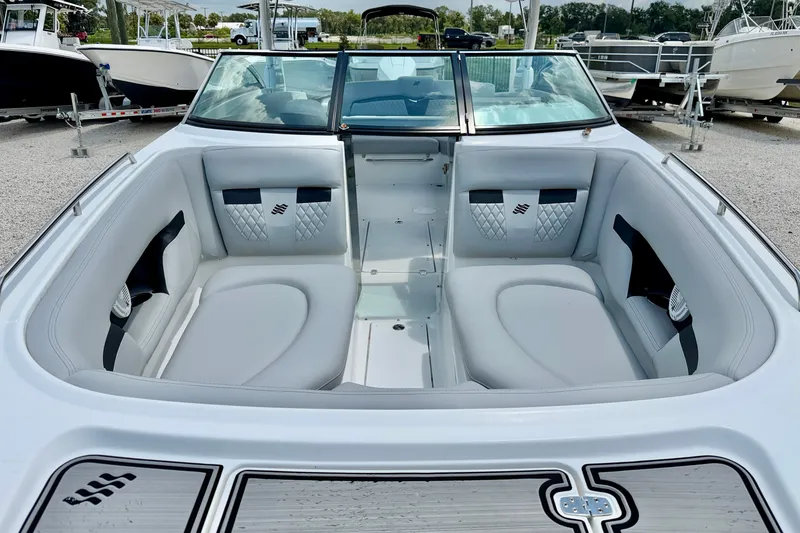 Slide: The Image of 2023 Four Winns HD8 OB boat interior with luxurious seating and modern design. - 8