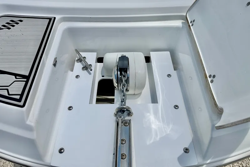 Slide: The Image of Anchor compartment of 2023 Four Winns HD8 OB boat, featuring a sleek design and secure fittings. - 31