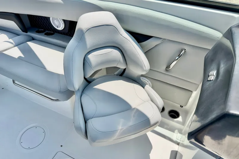 Slide: The Image of 2023 Four Winns HD8 OB boat interior with sleek seating and modern design. - 17