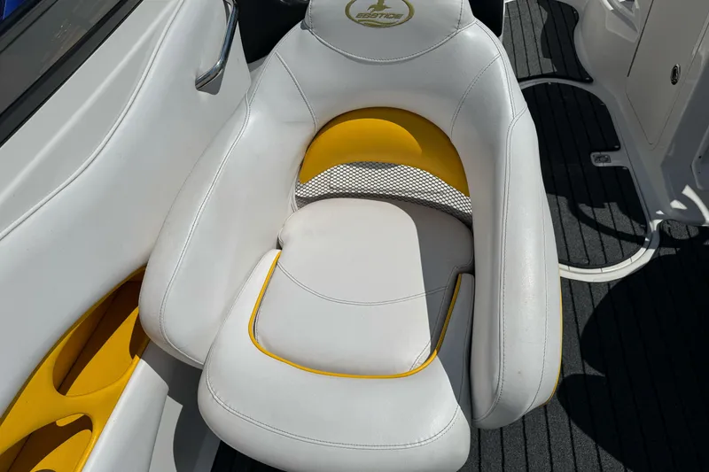 Slide: The Image of White and yellow seat on 2006 Ebbtide 2100 Bow Rider boat. - 16