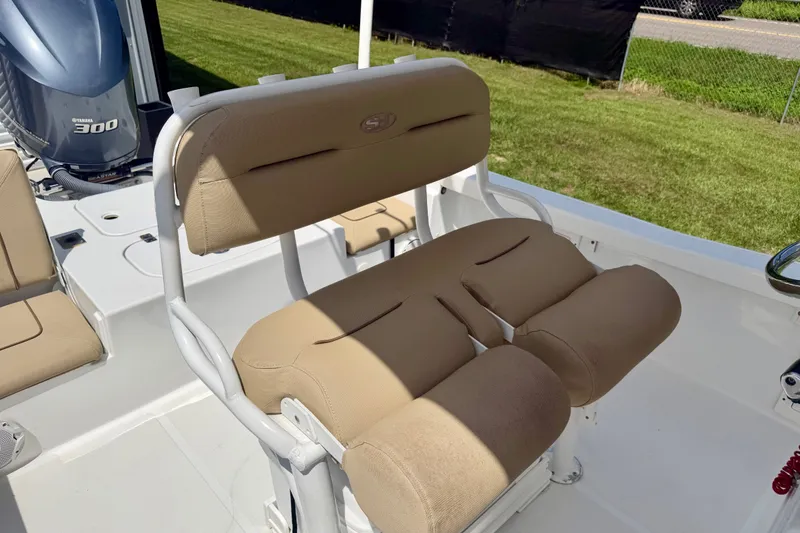 Slide: The Image of 2017 Sea Hunt BX25BR boat with tan seating and Yamaha 300 engine. - 16