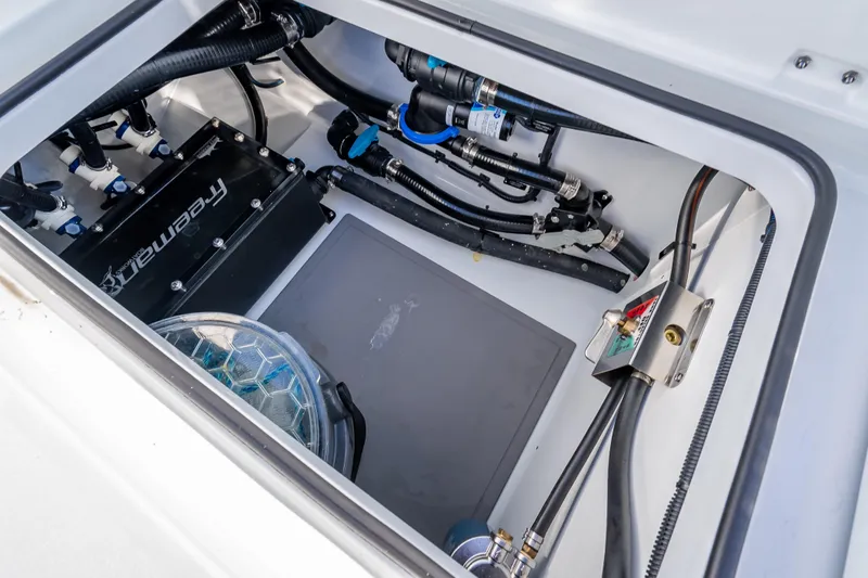 Slide: The Image of Engine compartment of 2026 Freeman 35 boat, showcasing wiring and components. - 17