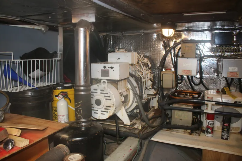 Slide: The Image of Engine room of 1981 Marine Trader 48 Trawler with equipment and wiring. - 14