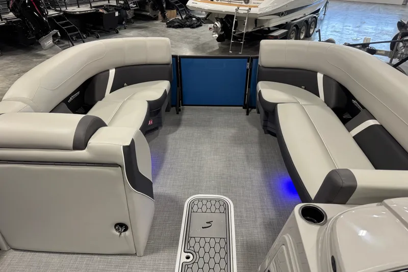 Slide: The Image of Luxurious interior of 2026 Sylvan X5 CLZ pontoon boat with plush seating and modern design. - 12