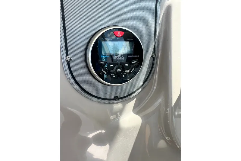 Slide: The Image of Close-up of a marine audio system on a 2005 Wellcraft 252 Coastal boat. - 24