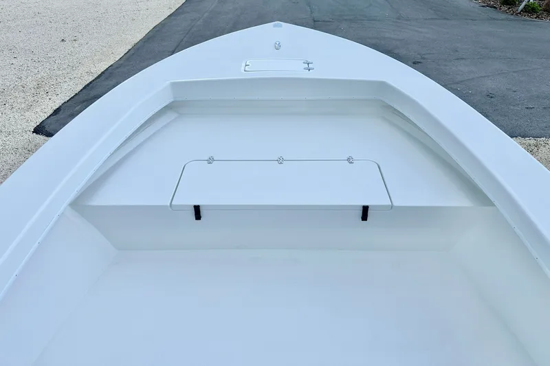 Slide: The Image of 2027 C-Hawk 25 Center Console boat deck, featuring a spacious and clean design. - 9
