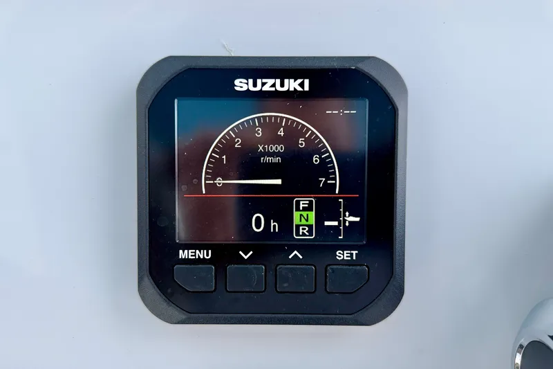 Slide: The Image of Suzuki digital gauge on 2027 C-Hawk 25 Center Console boat dashboard. - 22