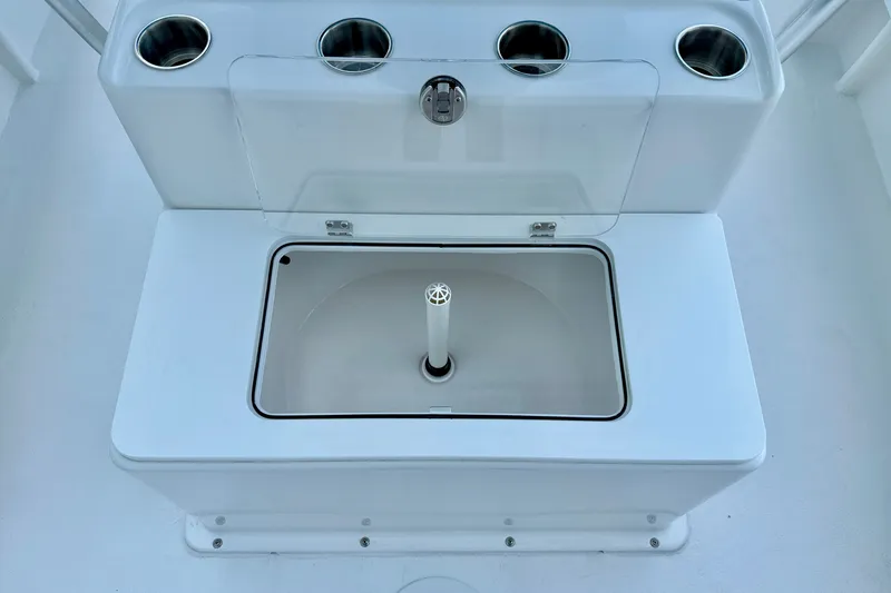 Slide: The Image of Livewell on 2027 C-Hawk 25 Center Console boat, featuring cup holders and storage. - 26