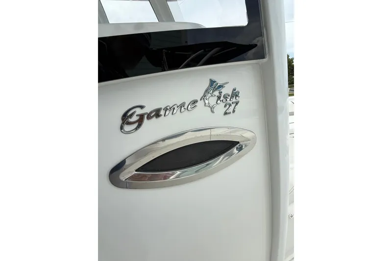 Slide: The Image of 2018 Sea Hunt Gamefish 27 boat emblem and logo detail. - 17