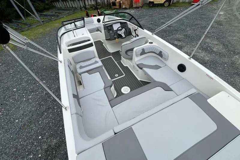 Slide: The Image of 2023 Bayliner VR6 Bowrider I/O interior with spacious seating and modern design. - 4
