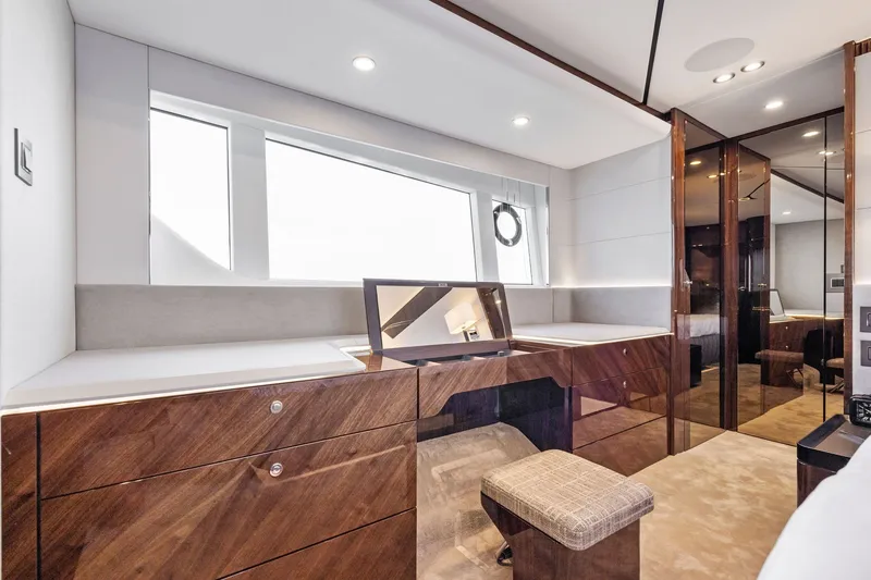 Slide: The Image of Luxurious interior of 2024 Fairline Phantom 65 yacht with elegant wood finish and modern design. - 33