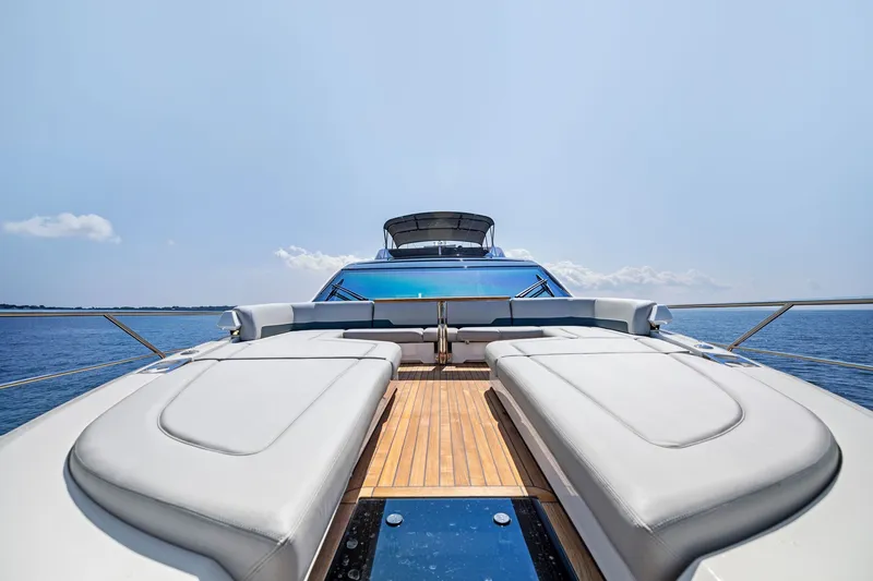 Slide: The Image of 2024 Fairline Phantom 65 yacht with luxurious deck and ocean view. - 69