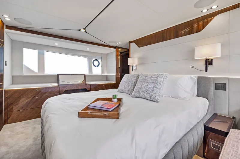 Slide: The Image of Luxurious bedroom interior of 2024 Fairline Phantom 65 yacht with elegant design and modern amenities. - 36