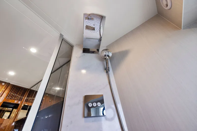 Slide: The Image of Luxurious shower in 2024 Fairline Phantom 65 yacht, featuring modern fixtures and elegant design. - 30